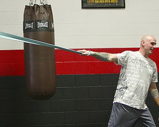 ROBERT K. YOSAY | THE VINDICATOR..Kelly Pavlik is back in the ring sparing and conditioning for his upcoming bout in May -- He sparred With ROMARO (ok) Johnson.-30-