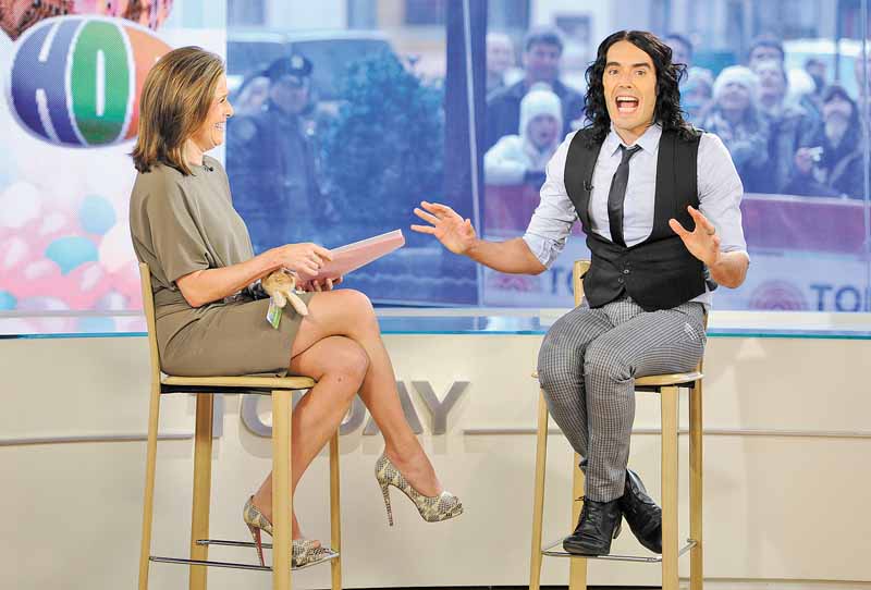 In this photo released by NBC, "Today" show co-host Meredith Vieira talks with actor Russell Brand on the "Today" show about his new movies "Hop" and "Arthur," Wednesday, March 30, 2011, in New York. (AP Photo/NBC, Peter Kramer) NO SALES