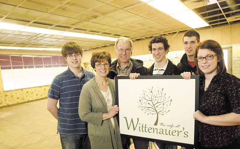 The Wittenauer family, from left, Ryan, 17, Terry, Doug, Mike, 21, Dave, 25, and Jessica, 22, will open a café in a former Poland pharmacy this fall.