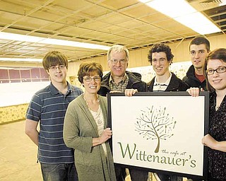 The Wittenauer family, from left, Ryan, 17, Terry, Doug, Mike, 21, Dave, 25, and Jessica, 22, will open a café in a former Poland pharmacy this fall.
