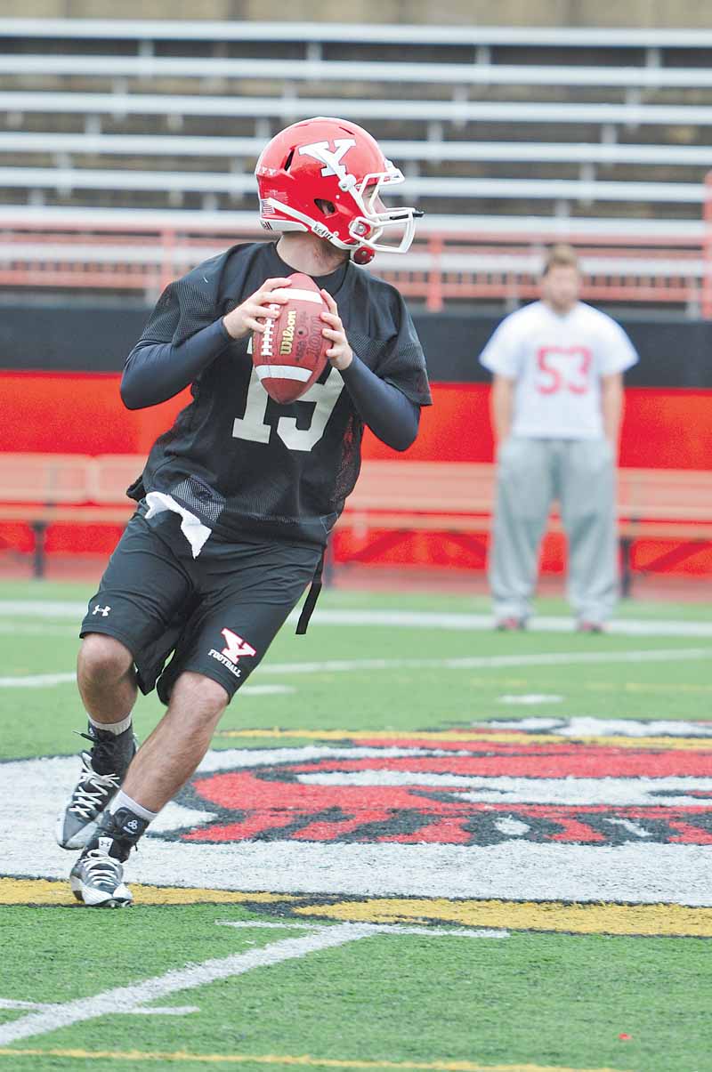 Youngstown State backup quarterback Marc Kanetsky gets ready to throw the ball during football practice Friday at YSU’s Stambaugh Stadium.