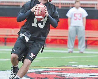 Youngstown State backup quarterback Marc Kanetsky gets ready to throw the ball during football practice Friday at YSU’s Stambaugh Stadium.