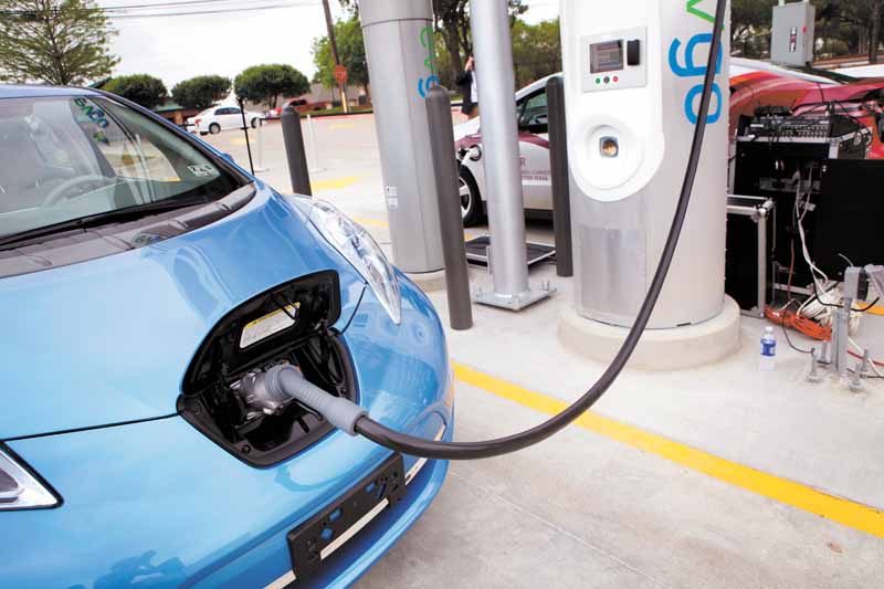 A Nissan Leaf is charged during a demo at the first ever quick charge electric vehicle charging station in the state of Texas, located at the Walgreens at Beltline and Monfort, which was unveiled in Dallas on Friday, April 8, 2011. It is one of dozens of new stations NRG Energy Inc. and others are planing for Dallas and Houston. 
