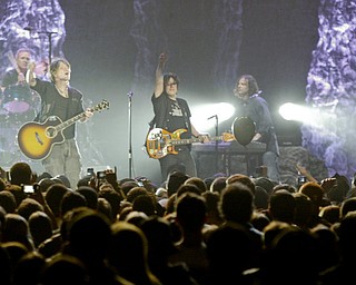 Guitarist John Rzeznik, left, and bassist Robby Takac of the Goo Goo Dolls perform at The Covelli Centre Tuesday, 4-12-11.