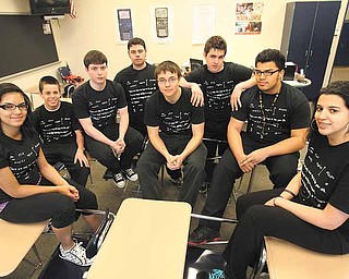 Modeling their shirts are Soroka’s students, from left, Tiffany Colon, Brian Austalosh, Ben Gozur, Ryan Phillips, Alex Sudacon, Thomas Merva, Chris Lopez and Jakeline Placeres. Missing from the photo are Kristy Vrona and Kaitlyn Kalicatzroa.