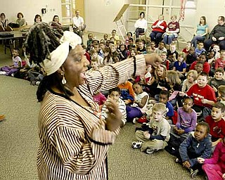 Storyteller Jocelyn Dabney of Youngstown is enthusiastic about the African-American oral tradition. She presented a program Friday at Liberty High School for pre-kindergarten through fourth-graders from E.J. Blott Elementary School.