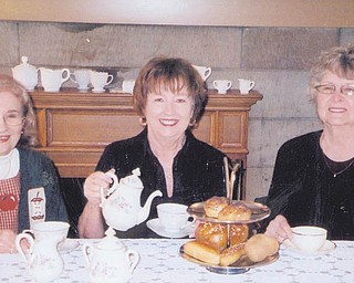 From left, Rae Jeanne Mollica, Marge Goldner and Joyce Pogany display a bit of what’s in store at the spring high tea planned for May 1 at Strock Stone House, an Austintown national historic landmark. Reservations are required before April 22. This is the 19th high tea the Austintown Historical Society has sponsored, and all proceeds go to the society.