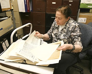 ROBERT K. YOSAY | THE VINDICATOR...Ann Harris has an office and storage room with tons of files about abandoned mines in the Ohio and Pennsylvania. SheÕs working weekly with a university archivist who will make sure the files are kept and cataloged properly in the future. This is for a story about sinkholes caused by subsidence and abandoned mines. Spring is the most common time for mines to cave and cause problems. ..-30-