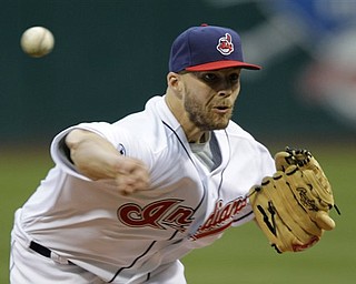 Cleveland Indians' Justin Masterson pitches against the Baltimore Orioles in the first inning of a baseball game Friday, April 15, 2011, in Cleveland. (AP Photo/Mark Duncan)