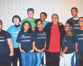 Eight local high school students were among the 90 others who participated in a recent 10-day Sojourn to the Past. Pictured are, from left, Shameka Walker of Youngstown Early College; Penny Wells of Sojourn, who prepared the students for the trip; Da’Nazha Fludd, YEC; Sean Barron, who accompanied the group; Shaniece Howell, YEC; Shatasia Walker, Chaney High School; Minnijean Brown Trickey, one of the Little Rock Nine; and Brittany Harris, Nigel Baldwin and Cordell Jackon, East High School. Missing the from picture is Gregory Jones of YEC.

