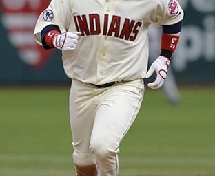 Cleveland Indians' Orlando Cabrera rounds the bases after hitting a two-run home run in the seventh inning of a baseball game against the Baltimore Orioles, Saturday, April 16, 2011, in Cleveland. 