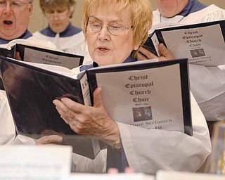 At a recent practice, Maryanne Stefanick of Cortland rehearses with fellow choir members for the “Colors of Grace” cantata. The cantata tells the story of the Passion of Christ through color, music, lyrics and narrative.