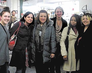 YSU fashion-merchandising students and their professor who recently spent four days in New York City experiencing different aspects of the fashion industry are, from left, Jennifer Daly, senior; Jennifer Frank, professor; Victoria Volpe, sophomore; fashion designer Nanette Lepore, with whom the students got a chance to spend time while they stopped in the city’s Garment District; Kristen White, junior; and Shamaila Younus, junior.