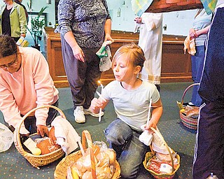 Allyson Smith, 9, of Austintown blows out a candle from the blessing.