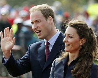 This Monday April 11, 2011 file photo shows Britain's Prince William accompanied by his fiancee Kate Middleton, as they arrive at Witton Country Park, Darwen, England. The full list of confirmed guests attending the royal wedding of Prince William and Kate Middleton was released by Britain's monarchy Saturday April 23, 2011. Soccer star David Beckham and his wife Victoria were among the most recognizable names on the list of guests at the April 29 nuptials. Royal family members from countries including Bahrain, Denmark, Spain and Morocco will also attend. Other guests include government officials, Afghan war veterans, and charity workers.