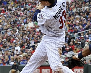 Minnesota Twins' Justin Morneau hit his second single of the baseball game in the eighth inning against the Cleveland Indians, Saturday, April 23, 2011, in Minneapolis where the Twins won 10-3. Morneau hit a two-run single earlier in his return to the lineup.