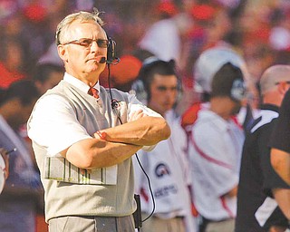 This Sept. 25, 2010, file photo shows Ohio State's coach Jim Tressel on the sideline during an NCAA college football game against Eastern Michigan, in Columbus, Ohio. The NCAA is accusing Tressel of lying to hide violations by players who traded memorabilia for cash and tattoos.  In a "notice of allegations" sent to the school, the NCAA said Monday, April 25, 2011,  that the alleged violations relating to the coach are considered "potential major violations."