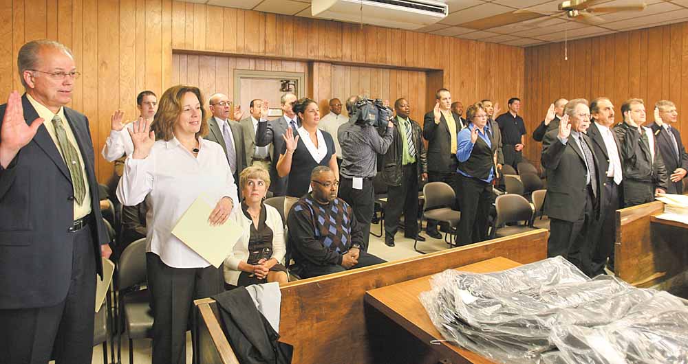 ROBERT K. YOSAY | THE VINDICATOR...Judge Elizabeth Kobly, Judge Bob Douglas and Judge Robert Milich  swore in over 30 part time officers to be the security force of the Youngstown Muny Court under the direction of the Youngstown Police Force...-30-