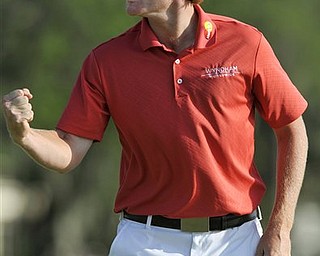 Brandt Snedeker celebrates his putt on the first playoff hole to tie Luke Donald on the 18th green and force a second playoff during the The Heritage golf tournament in Hilton Head Island, S.C., Sunday, April 24, 2011. Snedeker finished the tournament 12-under.