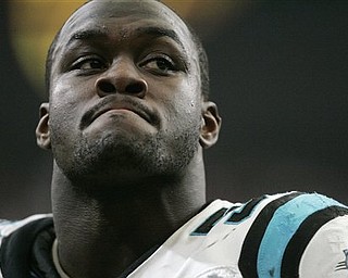 This Jan. 2, 2011, file photo shows Carolina Panthers linebacker Jon Beason reacts in the first half of a loss to the Atlanta Falcons,  at the Georgia Dome in Atlanta. It's been a nightmare eight months for the Panthers. A youth movement produced the NFL's worst team, coach John Fox was dismissed and potential franchise QB Andrew Luck stayed at Stanford. Holding the No. 1 pick, the Panthers prepare to make the biggest, and perhaps most difficult, draft decision in franchise history.