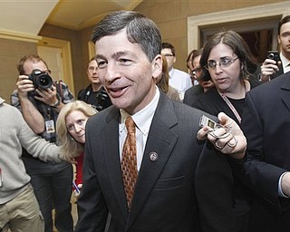 In this April 8, 2011 file photo, Rep. Jeb Hensarling, R-Texas, is surrounded by reporters on Capitol Hill in Washington. Shutting down Fannie Mae and Freddie Mac should fit seamlessly into the Republican drive to shrink government. After all, it has cost taxpayers $150 billion to keep the ailing mortgage giants afloat and many in both parties would rather let the private sector handle their role in financing the nation’s $11.3 trillion residential mortgage market. 