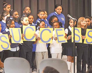 Williamson Elementary School kindergarten through second-graders gathered to encourage the school’s third- through fifth-graders who will be taking the Ohio Achievement Test on Friday. Williamson hosted a “Rally for the Test” on Wednesday. At right, Youngstown City Schools Superintendent Connie Hathorn speaks to students at the rally.