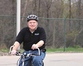 John Brown, a Warren resident and city councilman, is one person who’s opted to bike to work instead of driving. He’s pedaled his bike to his job at Thomas Steel Strip Corp., a 5-mile ride, for much of the past five years.