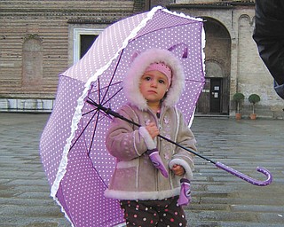 Mary Jane Montgomery sent this picture of her granddaughter, Gracie Guoan, 2 1/2, who is living in Naples, Italy, with her military family. She noted that spring is quite chilly and rainy there, too.