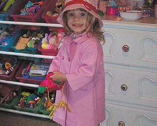 Olivia Rossi of Austintown picked out her own clothes to wear to go out and splash in the puddles!