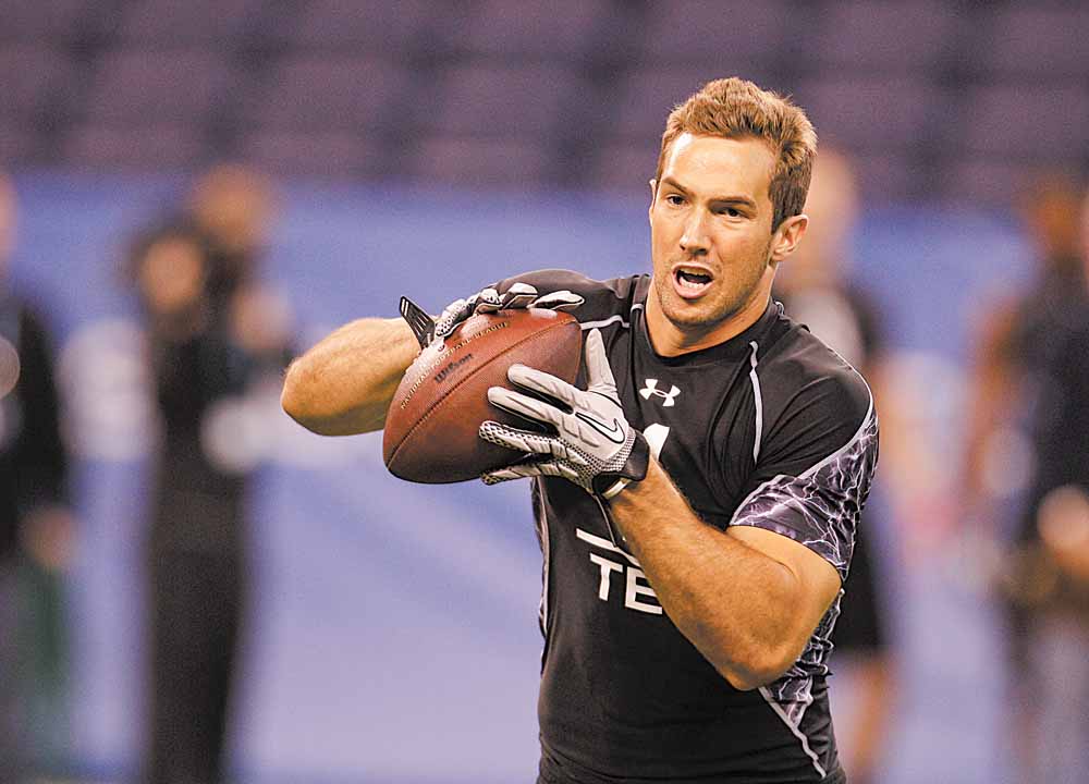 Southern California tight end Jordan Cameron runs a drill during the NFL football scouting combine in Indianapolis, Saturday, Feb. 26, 2011.