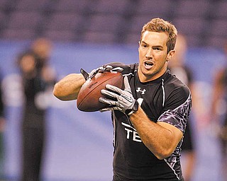 Southern California tight end Jordan Cameron runs a drill during the NFL football scouting combine in Indianapolis, Saturday, Feb. 26, 2011.