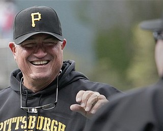 Pittsburgh Pirates manager Clint Hurdle reacts during batting practice before a baseball game against the Colorado Rockies, Saturday, April 30, 2011, in Denver.