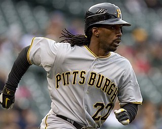Pittsburgh Pirates' Andrew McCutchen (22) heads to first after hitting a home run against Colorado Rockies starting pitcher Jason Hammel during the first inning of a baseball game on Saturday, April 30, 2011, in Denver. 