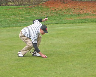 Frank Bellino of Liberty lines up a shot on Stambaugh’s venerable No. 1 hole.