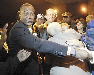 Doug Franklin won the Democratic nomination for Warren mayor Tuesday and celebrated at Enzo’s Restaurant. Among them was current Mayor Michael O’Brien, center. Franklin, who would be Warren’s first black mayor, defeated Jim Graham, president of UAW Local 1112.