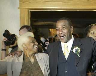 Doug Franklin won the Democratic nomination for Warren mayor Tuesday and celebrated at Enzo’s Restaurant. Among them was current Mayor Michael O’Brien, center. Franklin, who would be Warren’s first black mayor, defeated Jim Graham, president of UAW Local 1112.