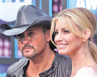 Country singers Faith Hill and Tim McGraw attend the 2010 CMT Music Awards, in Nashville, Tenn. on Wednesday, June 9, 2010.