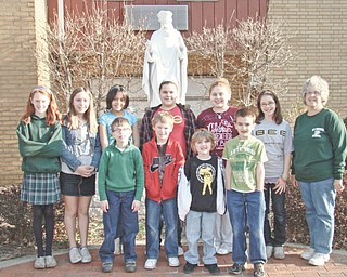 Lesson in teamwork
Students and staff members from St. Patrick School in Hubbard worked together to support the “Knight For a Cure Team,” which participated in the American Cancer Society’s Relay for Life events recently at Beeghly Center on the campus of Youngstown State University. The team raised $100 for the event by sponsoring a dress-down day at the school. In addition to taking part in various activities during the two-day event, members of the team spent a night at YSU. Students involved in the fundraiser are, from left in front, Gavin Espisito, Aidan Ealy, Jayden James and Vincent DePizzo, and in back, Katie Fagundus, Megan Scutillo, Samantha Rosser, Camryn Ealy, Lily Mild and Marie Bond, and their teacher, Elaine Scott. The classroom collecting the most loose change for the American Cancer Society will be treated to an ice cream party.