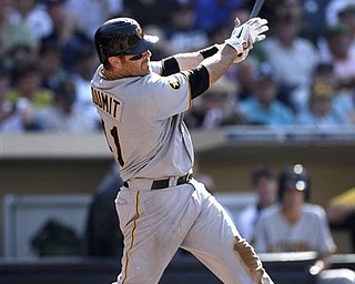 Pittsburgh Pirates' Ryan Doumit launches a grand slam homer against the San Diego Padres in the third inning of a baseball game, Wednesday, May 4, 2011, in San Diego. 