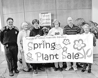 It is time to plant: Members of the Friends of Fellow Riverside Gardens Spring Plant Sale Committee want everyone to know it is time to purchase plants and have them ready to be placed in the garden when the sun comes out. The Friends will have a variety of annuals, herbs, vegetables, bulbs, shrubs and trees for sale from 9 a.m. to 7 p.m. Friday and 9 a.m. to 3 p.m. Saturday at the Davis Center at Fellows Riverside Gardens, 123 McKinley Ave., Youngstown. Volunteers, master gardeners and the knowledgeable staff at the gardens will be available to answer gardening questions. Holding a sign to attract gardeners or would-be gardeners to the sale are, from left, Rex Luckage, Sara Scudier, Janet Yaniglos, Linda and Stan Vuletich, and Mary Mihalick, committee members. There will be a preview showing and sale for members of the Friends from 4 to 7 p.m. Thursday.