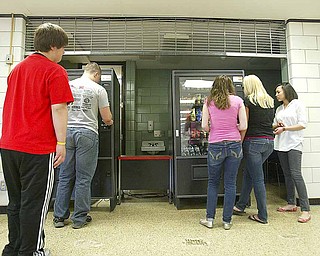 Lines form at the snack and beverage machines during the lunch hour at Boardman High School. A 2010 survey of school vending machines by the Mahoning County District Board of Health found overall a significant increase in healthier options but no improvement in vending-machine snack choices.