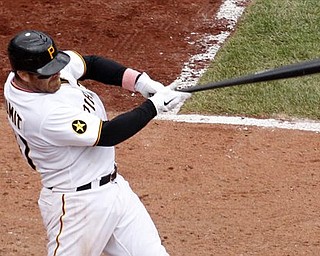 Pittsburgh Pirates' Ryan Doumit (41) hits a three-run home run off Houston Astros pitcher Fernando Abad in the eighth inning of a baseball game in Pittsburgh, Sunday, May 8, 2011. The Pirates won 5-4.