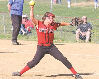 Struthers pitcher Katie Jordan fires the ball toward home plate during the Division II sectional opener Monday
against Hubbard High School at Harding Park. The Wildcats advance to a sectional semifinal today against Southeast after shutting out the Eagles on a 6-0 two-hitter by junior pitcher Rachel Affagato.