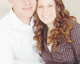 Adam J. Grund and Christy A. Helsel