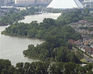 Water from the flooded Mississippi River rises close to the Pyramid in downtown Memphis, Tenn., Monday, May 9, 2011.