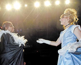 Chaney High School students Janaiah Spearman, left, as the Fairy Godmother, and Kaitlyn Cook as Cinderella rehearse a scene from “Cinderella” Wednesday at the school. Friday evening’s performance will be the final traditional theatrical production at the school.