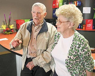 Roger and Gloria Jones, for whom the Oh Wow! children’s center is named, talk Thursday morning about their contribution to and interest in the facility at 11 W. Federal St., Youngstown.