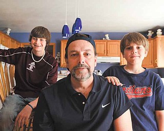 Jerry Jones and his sons, Eric, 14, left, and Austin, 10, will have a team at this weekend’s Relay For Life of Boardman. Jerry and Eric plan to walk all 24 hours of the Relay For Life.