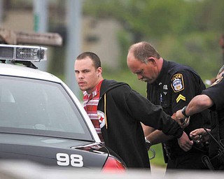 Police arrested Aaron Freet, one of two suspects in a burglary of a Beaver Township home. The suspects led police on a chase Monday morning that traveled through parts of Beaver, Springfield and Poland townships and Struthers before ending when the car crashed in Youngstown.