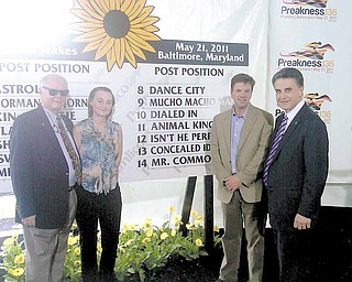 Canfield’s Bruce Zoldan, far right, stands with, from left, Barry Irwin, Kathy Irwin and Animal Kingdom trainer Graham Motion after Wednesday’s post drawing for Saturday’s Preakness Stakes at Pimlico Race Course in Baltimore. Irwin owns Team Valor which owns the Kentucky Derby winner. Zoldan is one of the Team Valor investors. 

